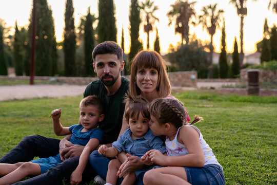 Happy family together on the lawn