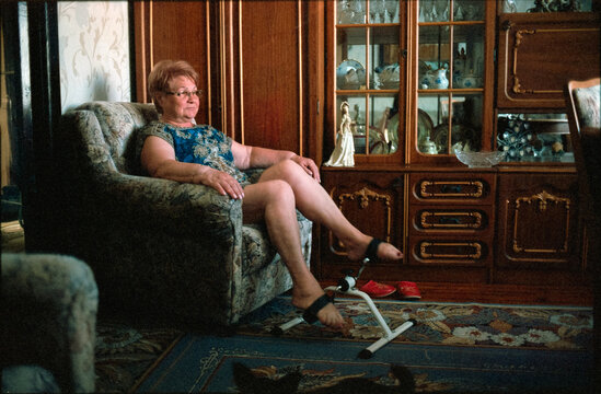 Woman and pedal exerciser