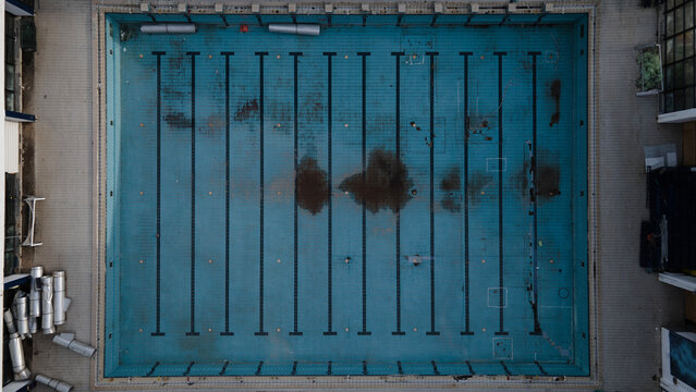 Empty and Deteriorating Swimming Pool From Above