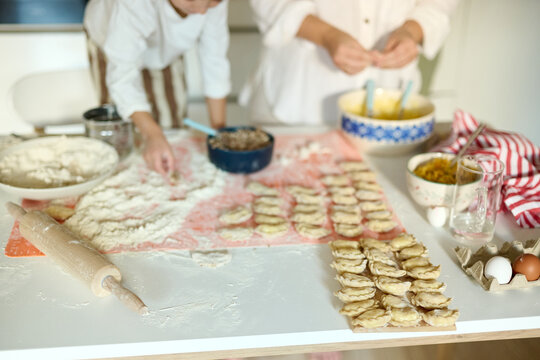 Homemade Dumplings Preparation on Kitchen Table