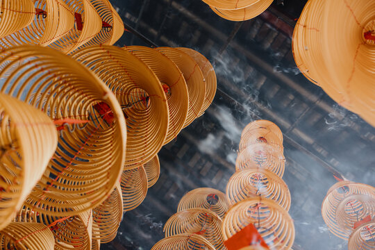 Hanging Spiral Incense Coils in Temple Interior