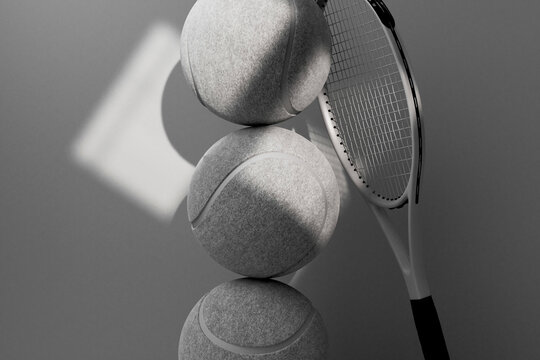 Close-Up Stack of Tennis Balls with Racket