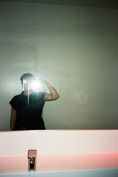 Self portrait with flash in an empty room