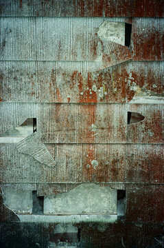 Weathered brick wall with openings