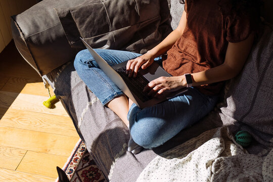 Casual Home Office Setup: Working From Couch Laptop