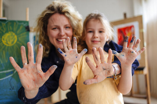 Joyful Hands Painted by Mother and Child