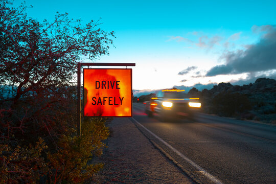 Drive safely on open road at dusk

