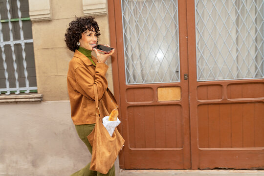 Woman sending voice message