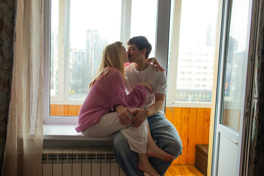 A young couple in the flat