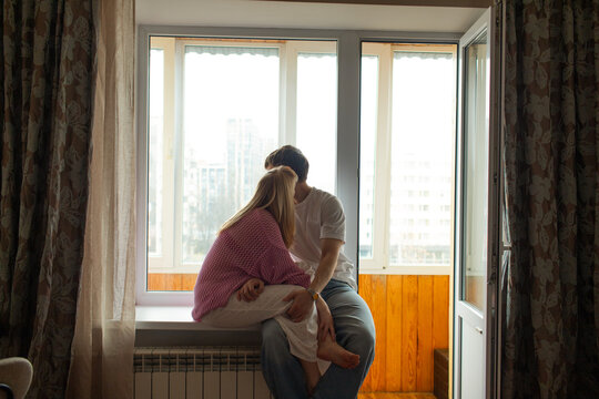 A young couple in the flat