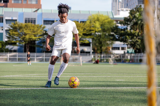 Soccer player attempting to score