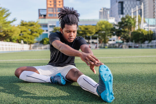 Soccer player warming up before practice