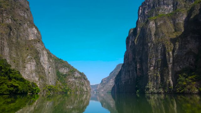 Perfect Reflection of Sumidero Canyon Cliffs in Grijalva River. Chiapas, Mexico.