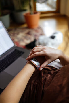 Cozy Home Office Moment With Smartwatch And Laptop