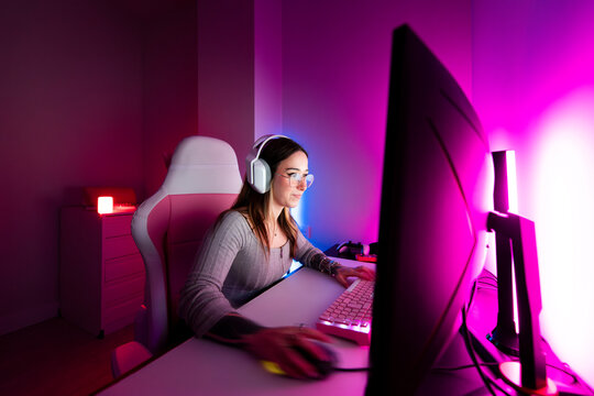 Happy gamer having fun playing on PC
