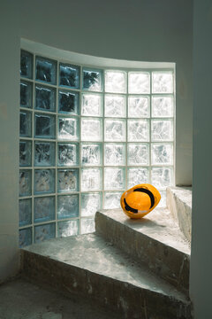 Yellow helmet on the staircase without flooring 