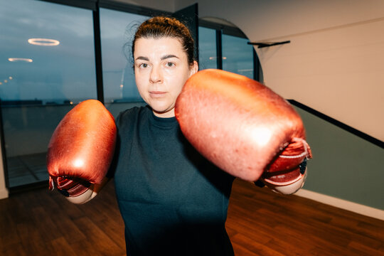 Boxer Practices Technique in Training Area During Evening Hours