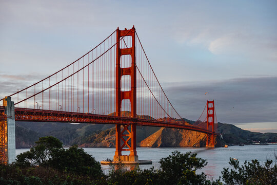 Golden Gate Bridge Stands Tall Over Water at Sunset