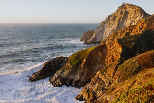 Coastline View With Waves Crashing Against a Rocky Shore