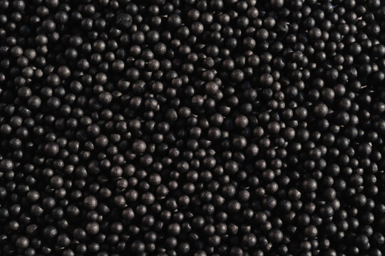 Black Beads on Surface Create Uniform Texture in Close View