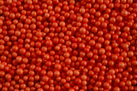 Bright Red Spheres Fill the Surface in a Close-Up View