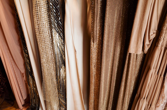 Different Types of Fabric  for Dresses Hang in a Clothing Store