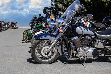 Fototapeta premium Motorcycles in a parking lot in the city