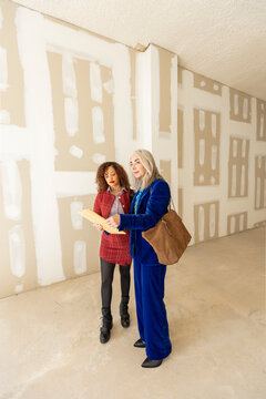 Real estate agent visiting commercial space with client