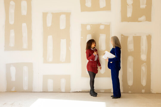 Realtor discussing lease conditions with client