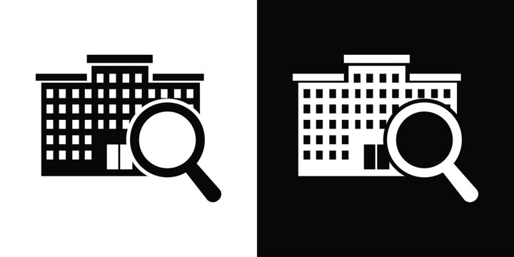 Search for property or real estate inspection icon. Magnifying glass over a building symbol for house hunting, apartment search, or building analysis. Black and white vector illustration.