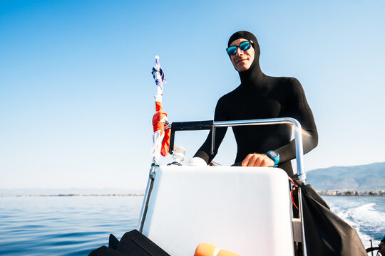 freediver driving safety boat after training
