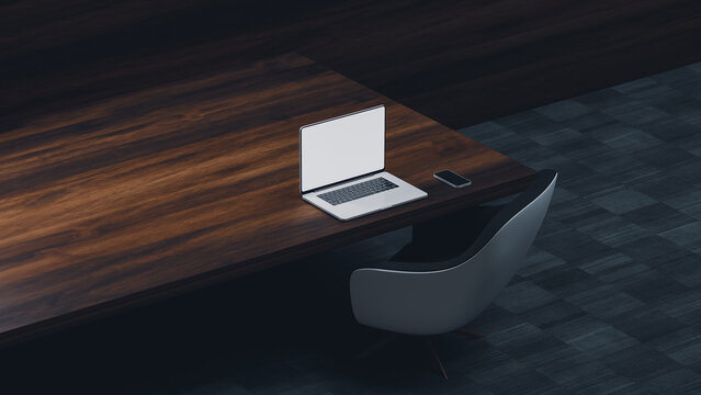 Work setup in modern interior with chair and laptop on desk