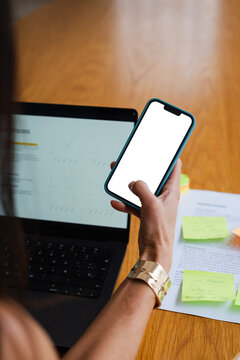 Anonymous woman uses technical devices