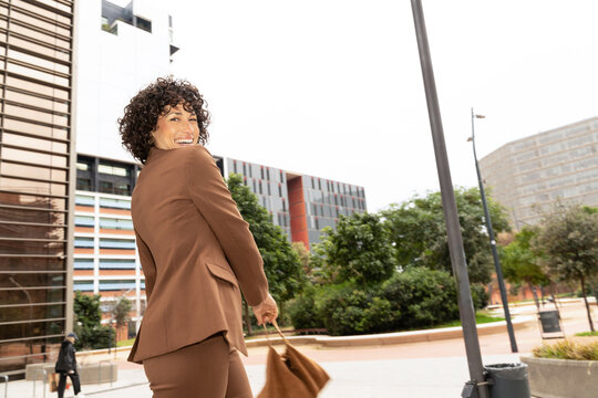 Woman looking back smiling