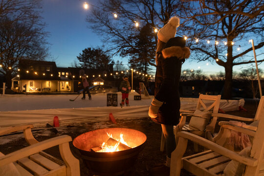 Backyard Skating rink bonfire family together