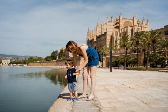Mother and Toddler Enjoying a Day Near Palma Cathedral