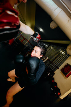 training of a female boxer dodging a punch