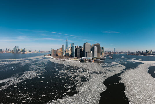 Aerial view of Lower Manhattan with frozen Hudson River
