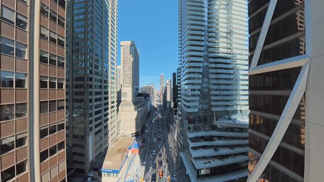 Toronto City Bloor street corridor between tall residential and office towers