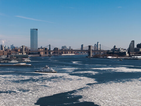 Ice floes on East River with ferry