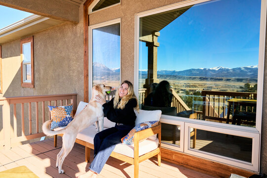 Happy Pet Owner At Home Colorado