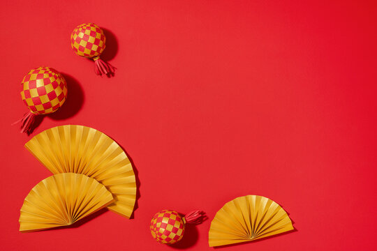 Chinese New Year decorations on a vibrant red background