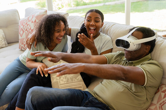 Family bonding with virtual reality headset fun