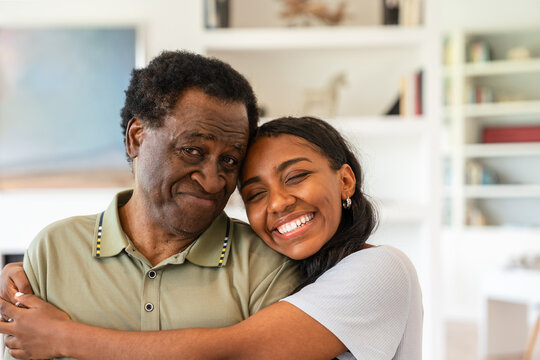 Heartwarming embrace of grandfather and granddaughter