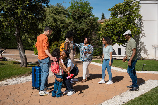 Family reunion in a sunny outdoor setting