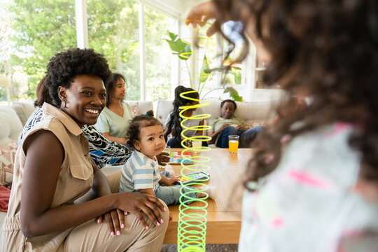 Family gathering with joy and play on a sunny day