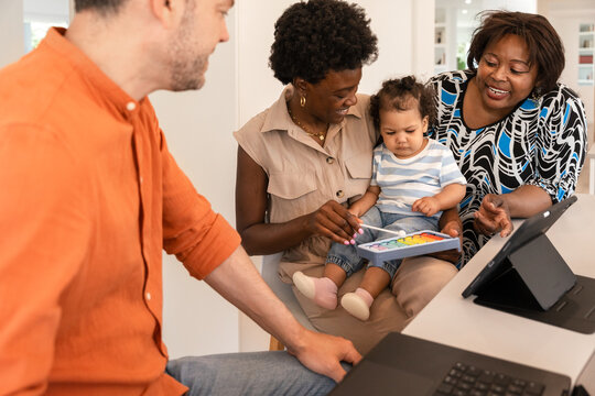 Family time with a colorful xylophone and laptop
