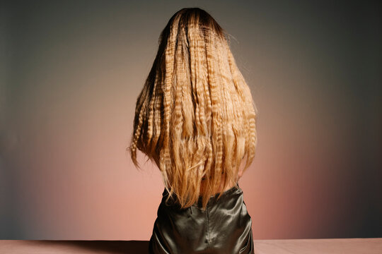 Back View Of Crimped Hair Portrait In Studio