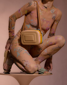 Pastel Fashion Pose With Floral Bodysuit