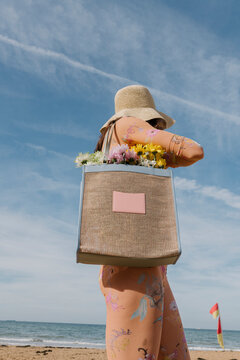 Sunlit Beach Shopper With Floral Bag
